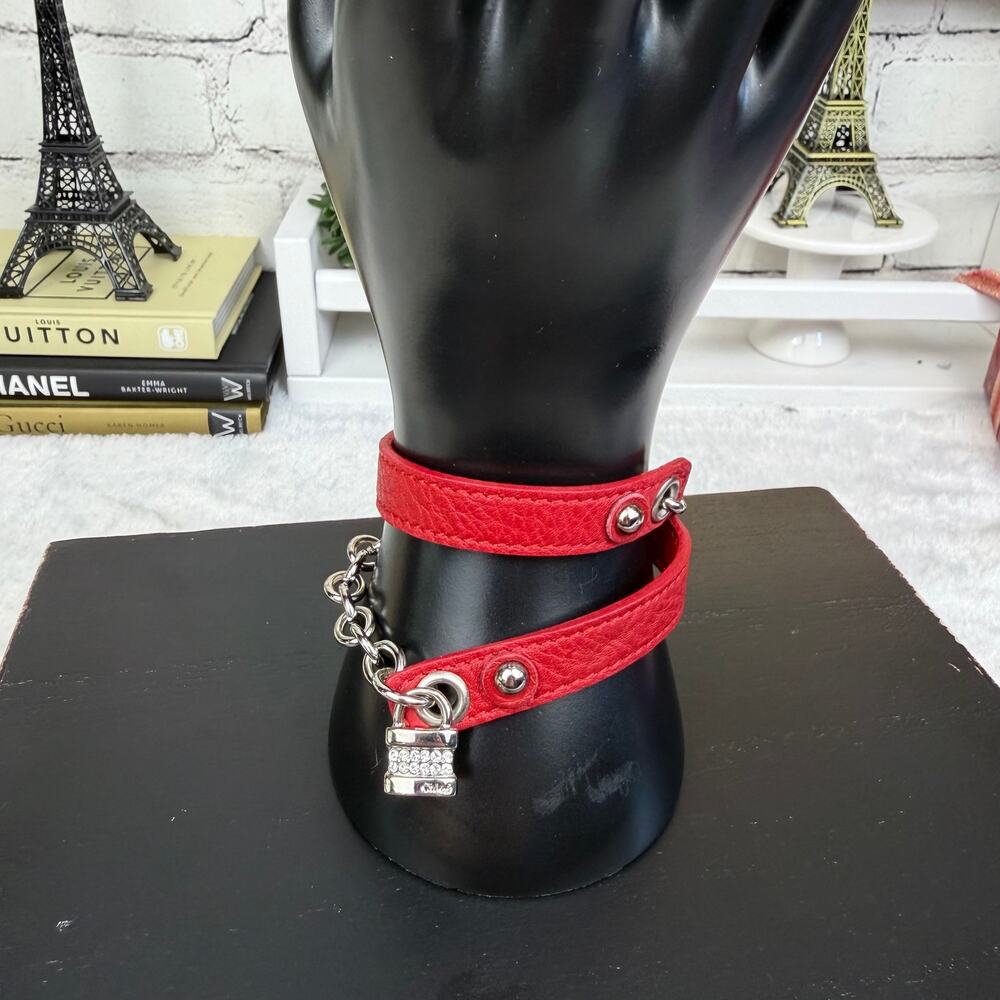 Chloe red leather wrap bracelet. Silver charm hardware. Vintage but NEW!!